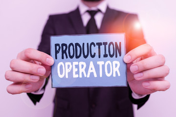 Writing note showing Production Operator. Business concept for control equipment used in the analysisufacturing process Male human wear formal work suit with office look hold book