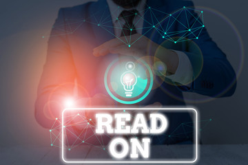 Conceptual hand writing showing Read On. Concept meaning spend time reading in order to find out...