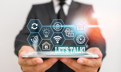 Conceptual hand writing showing Let S Talk. Concept meaning they are suggesting beginning...