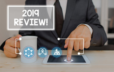 Writing note showing 2019 Review. Business concept for remembering past year events main actions or good shows