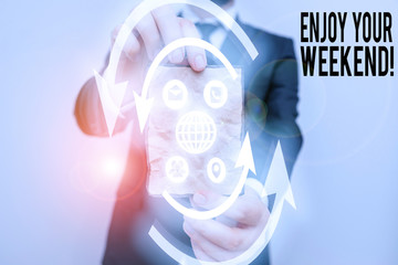 Conceptual hand writing showing Enjoy Your Weekend. Concept meaning wishing someone that something...