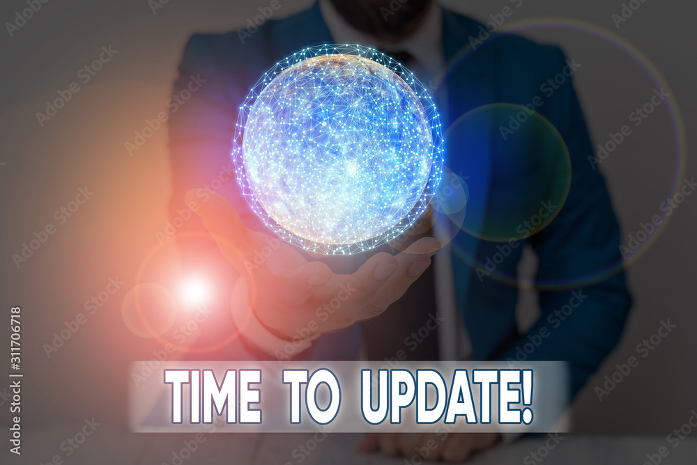 Wall mural writing note showing time to update. business concept for this is right moment to make something mor