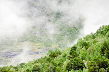 Fototapeta na wymiar Norwegian Fjord and their waterfalls in Norway