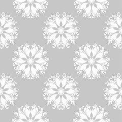 Gray seamless background with white floral pattern