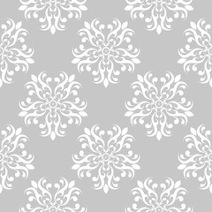 Fototapeta premium Floral seamless pattern on gray background. White design