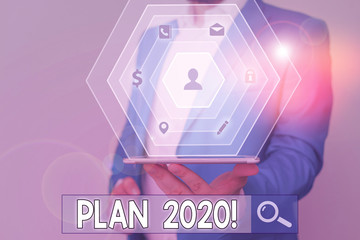 Conceptual hand writing showing Plan 2020. Concept meaning detailed proposal doing achieving...