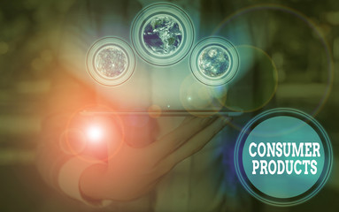 Writing note showing Consumer Products. Business concept for goods bought for consumption by the average consumer Elements of this image furnished by NASA