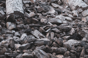 Pile of stones. heap of rocks. ruins of destroyed buildings
