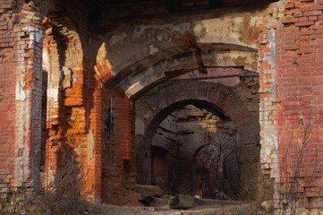 Fototapeta na wymiar Old ruins. destroyed red brick walls of ancient building