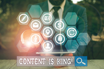 Writing note showing Content Is King. Business concept for marketing focused growing visibility non paid search results