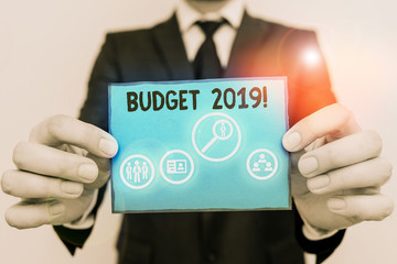 Conceptual hand writing showing Budget 2019. Concept meaning estimate of income and expenditure for current year