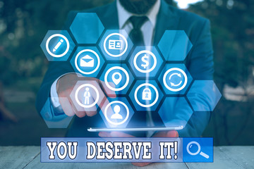 Writing note showing You Deserve It. Business concept for should have it because of their qualities...