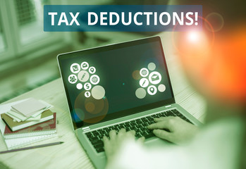 Text sign showing Tax Deductions. Business photo text reduction income that is able to be taxed of expenses