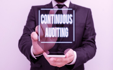 Conceptual hand writing showing Continuous Auditing. Concept meaning Internal process that examines...