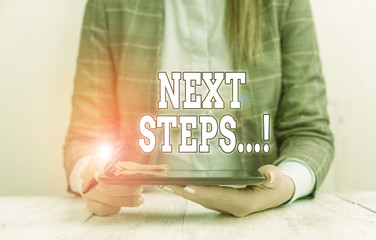 Conceptual hand writing showing Next Steps. Concept meaning something you do after you have...
