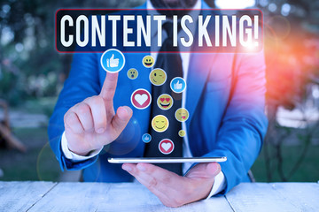 Writing note showing Content Is King. Business concept for marketing focused growing visibility non paid search results