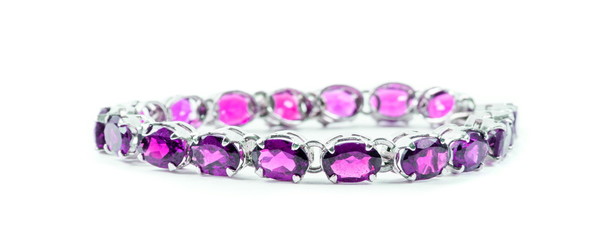 Bracelet with the ruby stones on the white