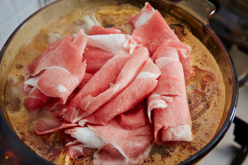 Pork in Korean kimchi and seafood hot pot 