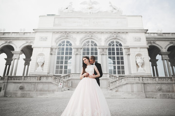 Lovely happy wedding couple, bride with long white dress