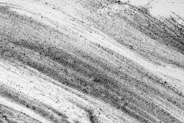 Black and white image of abstract stripes on glass.