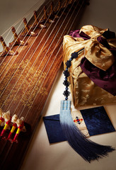 Korean traditional gifts and gayageum. gayageum is a Korean traditional musical instrument.