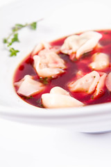 Polish Christmas Eve dish:clear borscht with dumplings (uszka)	