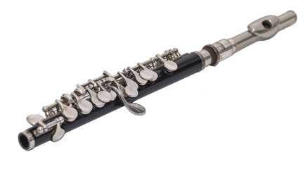 Piccolo flute on white background, selective focus. - obrazy, fototapety, plakaty
