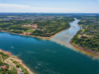 Fototapeta premium Aerial view of the landmark of the three borders (hito tres fronteras), Paraguay, Brazil and Argentina in the Paraguayan city of Presidente Franco near Ciudad del Este..