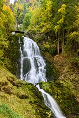 Fototapeta na wymiar Giessbach waterfalls in autumn, interlaken, Switzerland.
