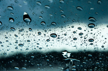 Water drop on a glass during raining season