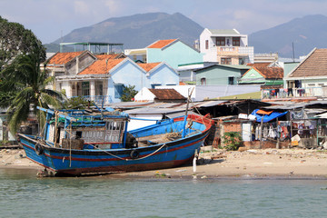 Vietnam, Nha Trang - December 11, 2019-Traditional houses, boats and river in Nha Trang.