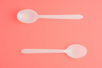 Plastic Spoons On Pink Background, White Plastic Spoons