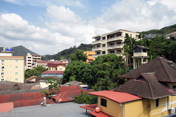 Obraz premium Phuket, Thailand-November 20, 2019: top view of hotels, houses and a street in Patong.