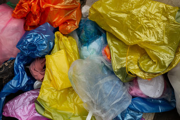 discarded plastic raincoats and boots