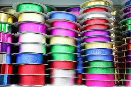 Colorful fabric ribbon tapes in shop