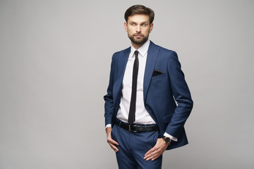 Fototapeta premium studio photo of young handsome businessman wearing suit