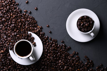  Coffee cup and beans on old grey kitchen beton , rock table. Top view with copyspace for your text