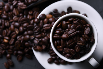  Coffee cup and beans on old grey kitchen beton , rock table. Top view with copyspace for your text