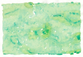 緑の水彩絵の具でスポンジを使って描いた背景素材