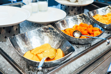 canned fruit in a plate in the kitchen of the restaurant
