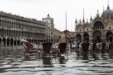 chairs in flooded San Marco square