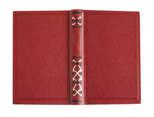 Open old book with vintage red cover isolated on white, top view
