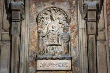 Interiors of building with sculptures of the Milan Cathedral (Duomo di Milano), the cathedral church of Milan, Lombardy, Italy. Dedicated to the Nativity of St Mary.