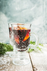 Mulled red wine on the rustic background. Selective focus. Shallow depth of field.
