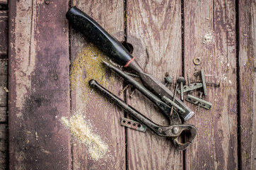 Hand tools for repair on a wooden surface