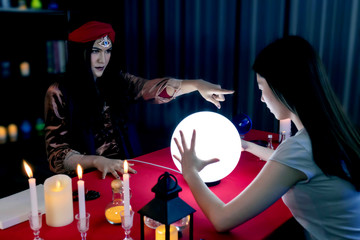 Fortune teller, astrology, prediction, forecast the future to female customers In beliefs, life,...