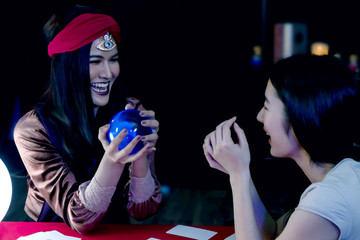 Fortune teller, astrology, prediction, forecast the future to female customers In beliefs, life,...