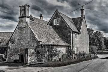 Old stone house in England in dramatic style