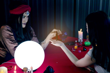 Fortune teller, astrology, prediction, forecast the future to female customers In beliefs, life,...