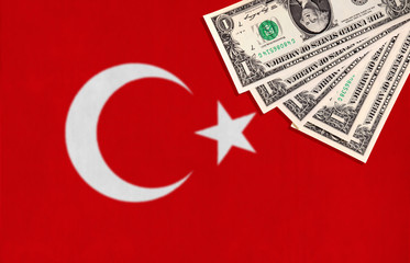 Turkish flag with US dollars in the corner
